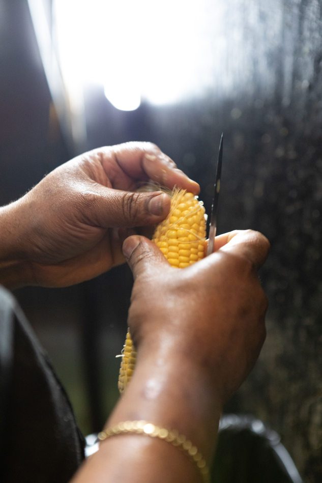 Getting every sweet kernel from a freshly boiled corn cob requires a steady hand.